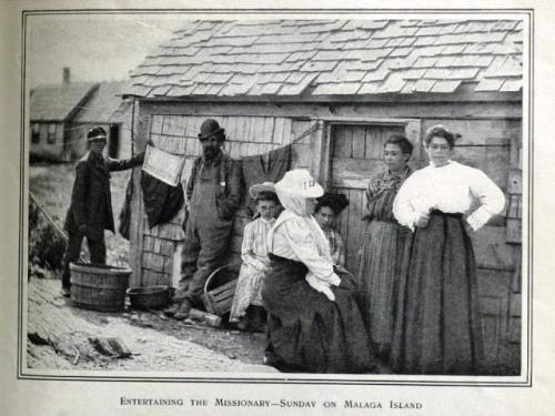 A copy of a photo by Frederick Thompson from Harper’s New Monthly Magazine, September 1882, shows residents on Malaga Island.